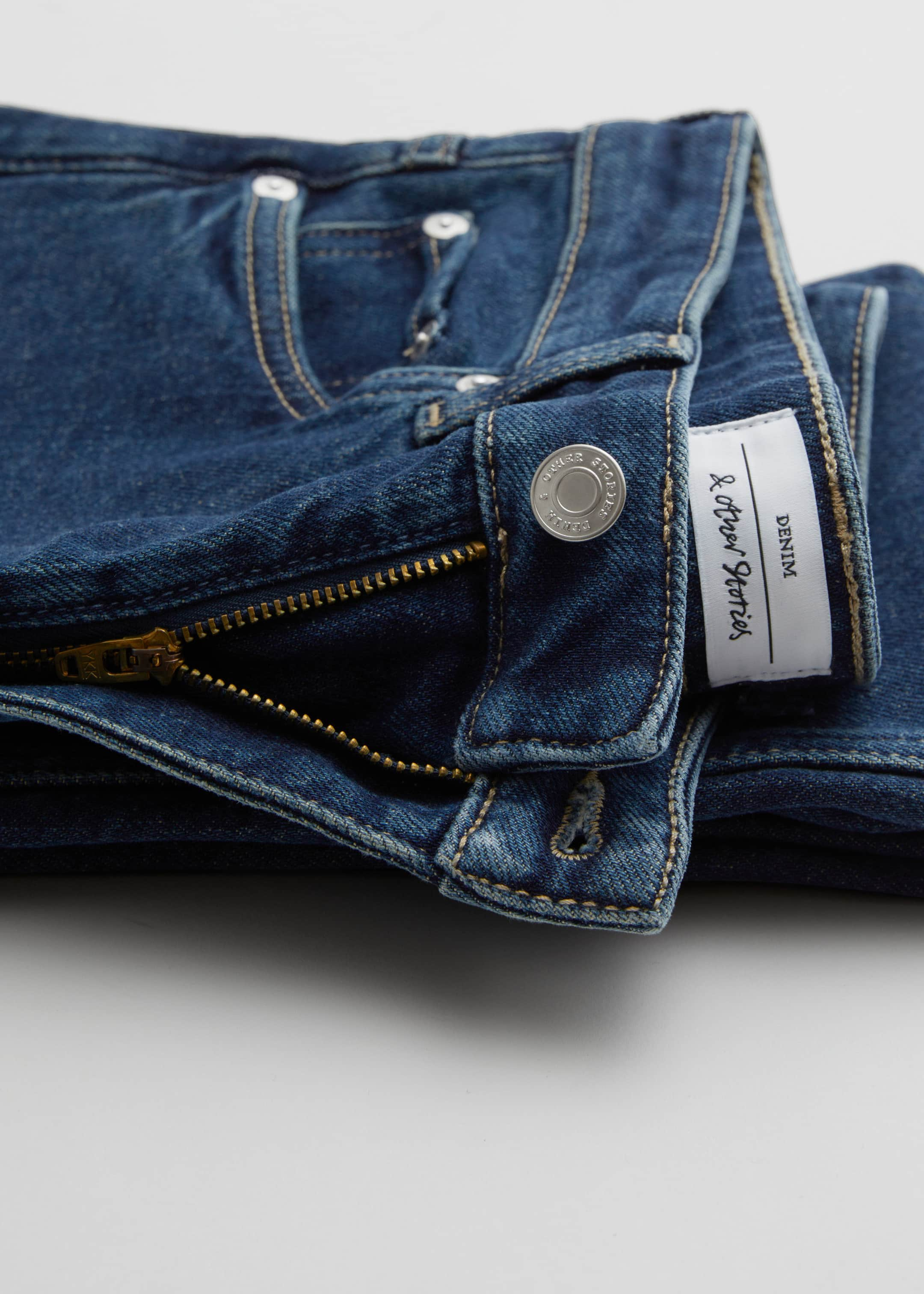 Slim Cut Jeans - {{variantName}} - Descriptive Detail