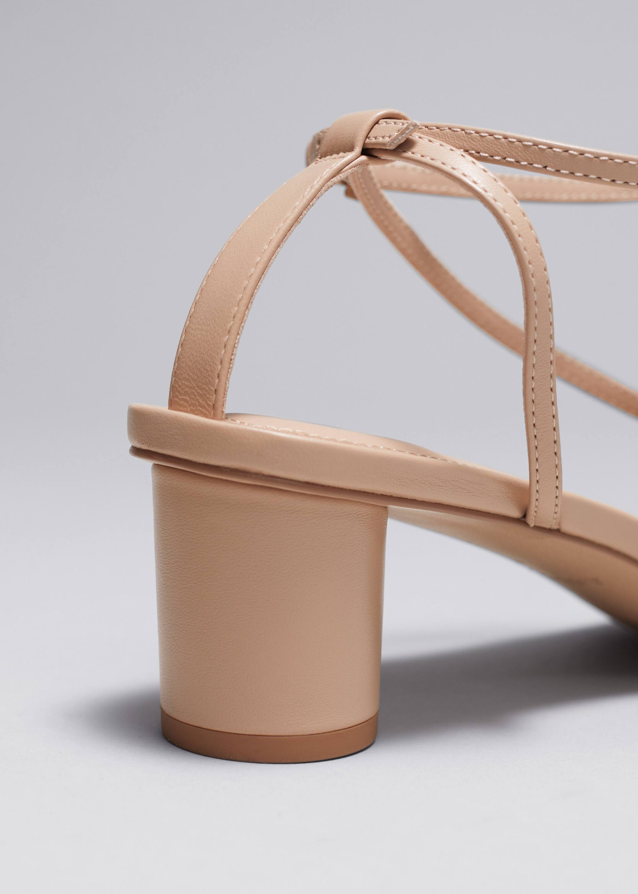 Heeled Leather Sandals - {{variantName}} - Descriptive Detail