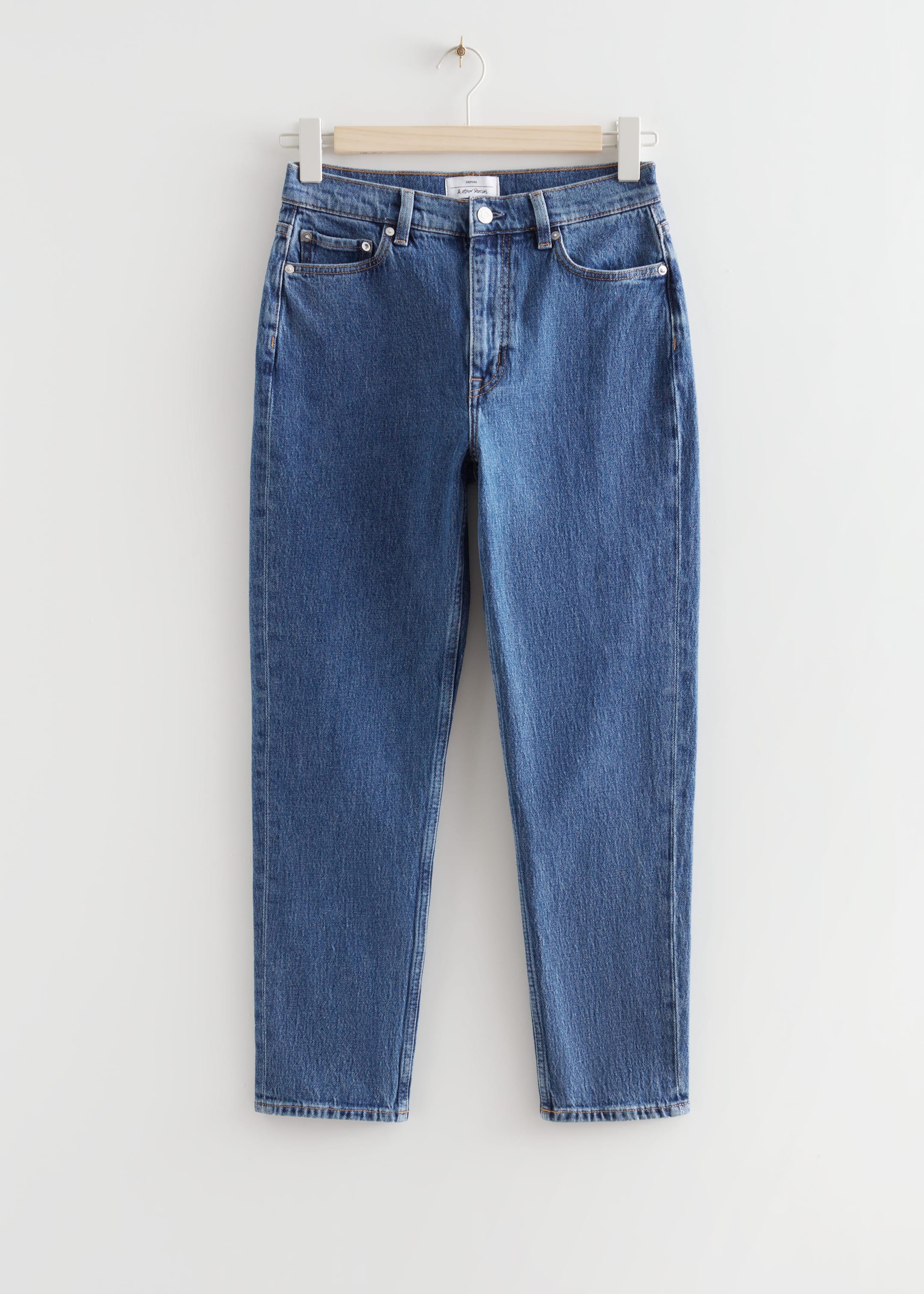 Mid rise tapered jeans best sale