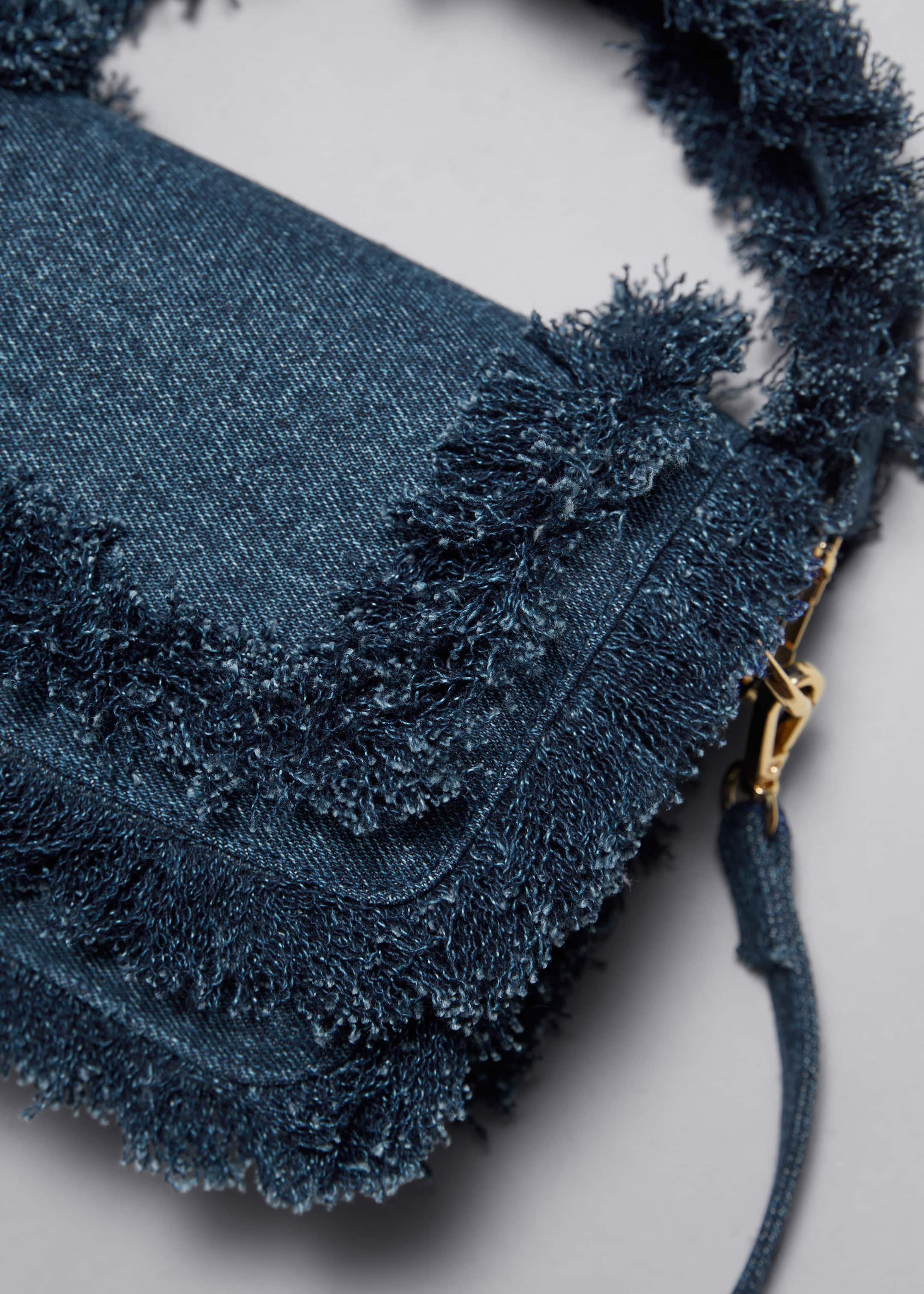 Frayed Denim Bag - {{variantName}} - Descriptive Detail