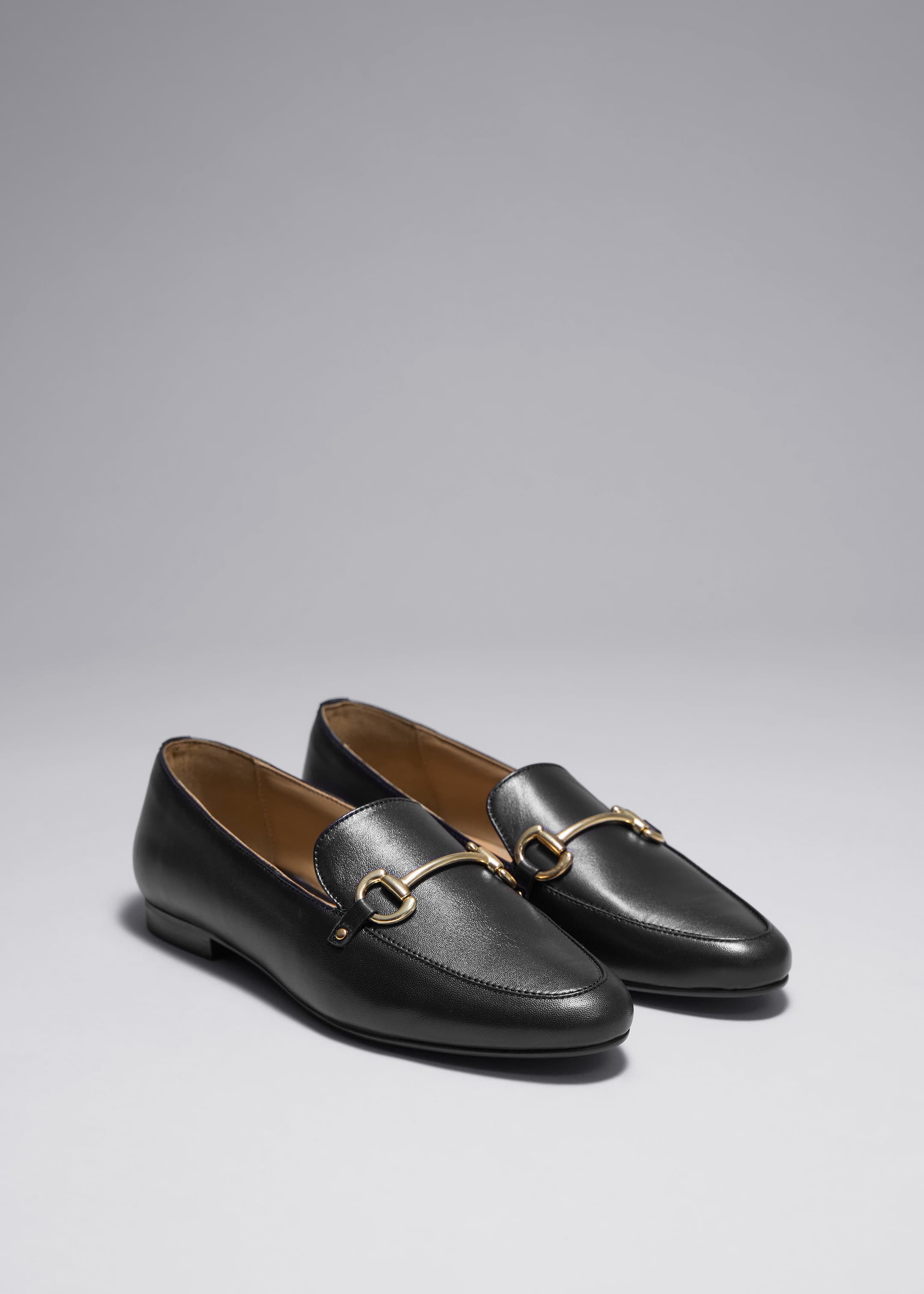 Equestrian Buckle Loafers - Black - Still Life