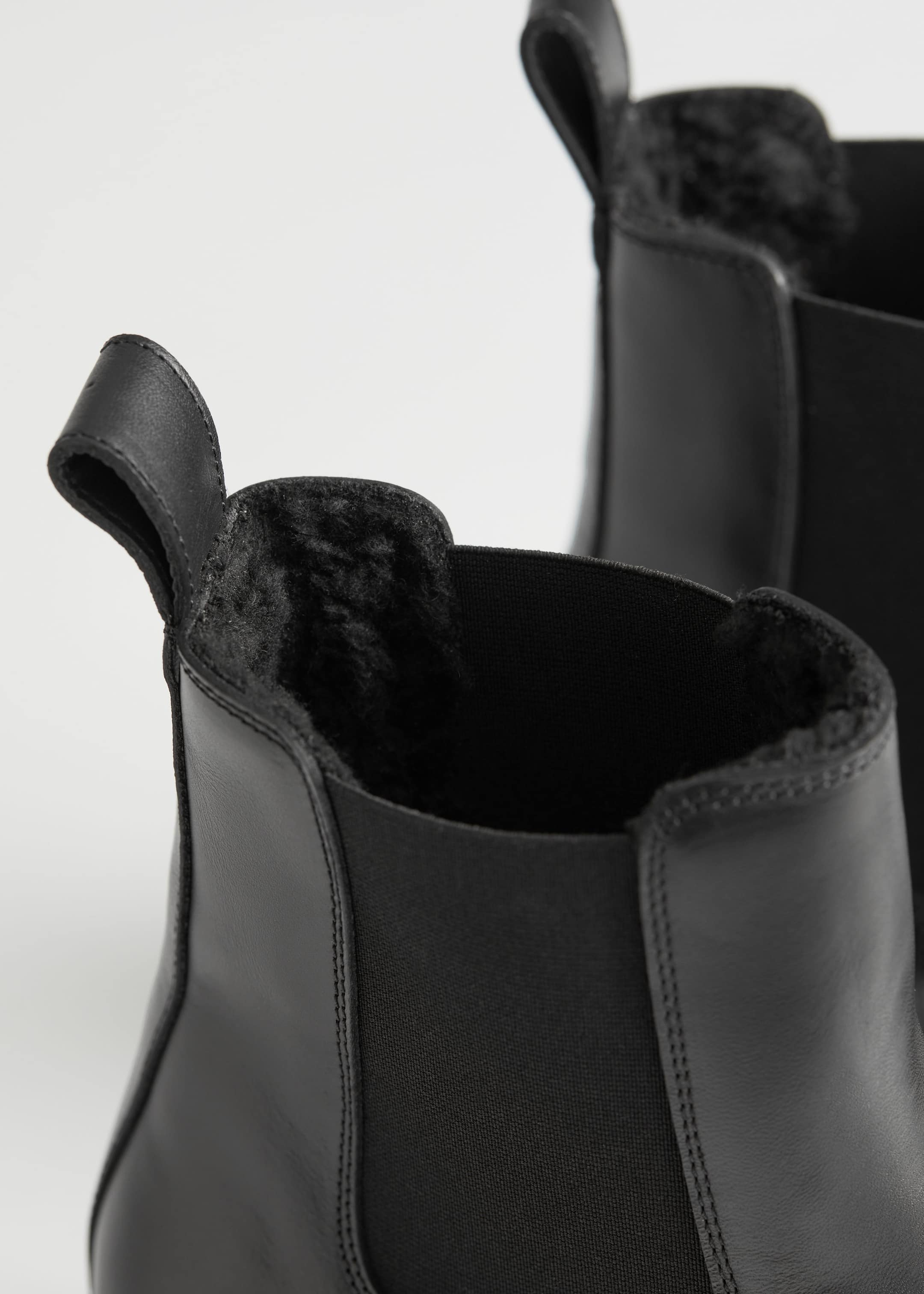 Black faux leather chelsea boots online