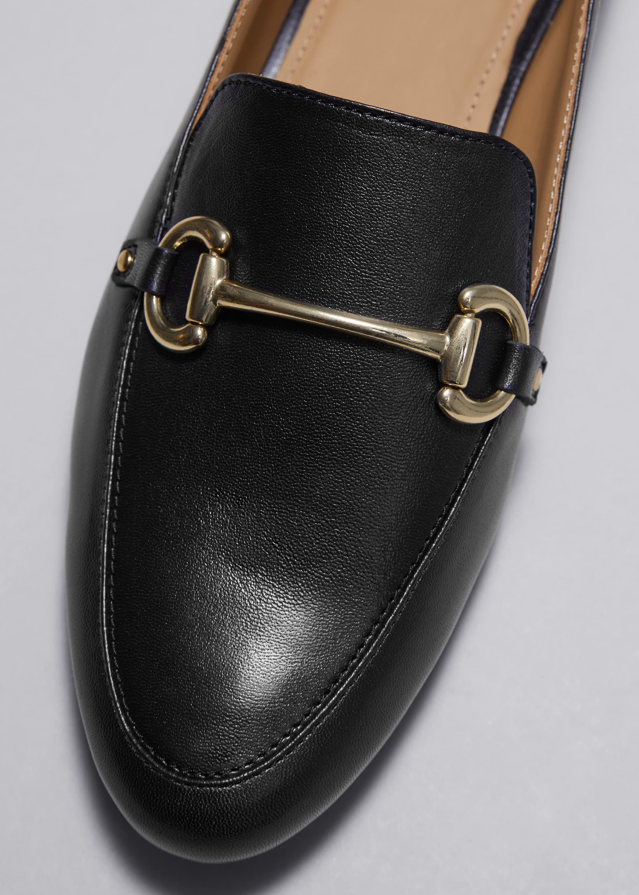 Equestrian Buckle Loafers - Black - Still Life