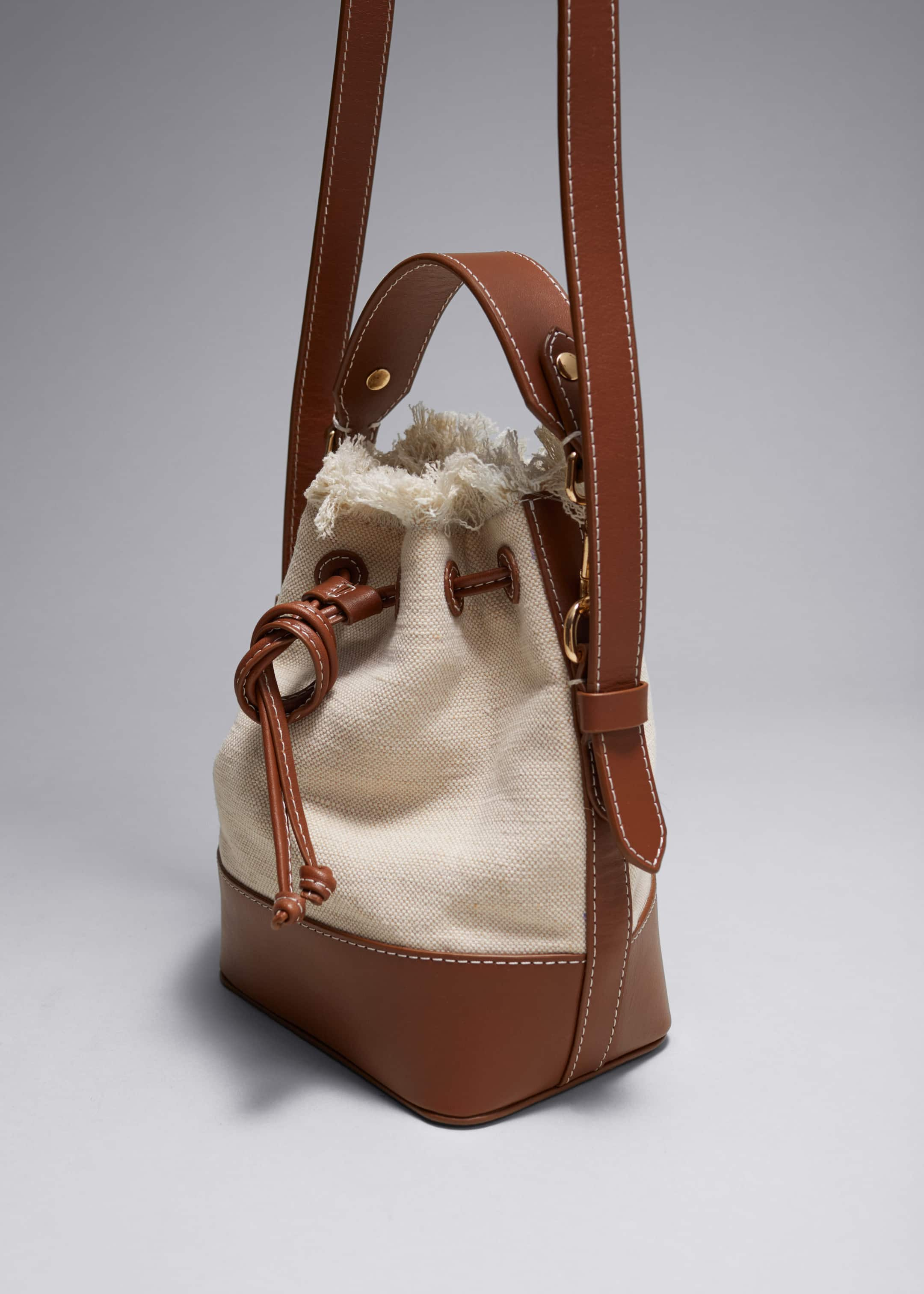 Leather-Trimmed Canvas Bucket Bag - Beige - Still Life