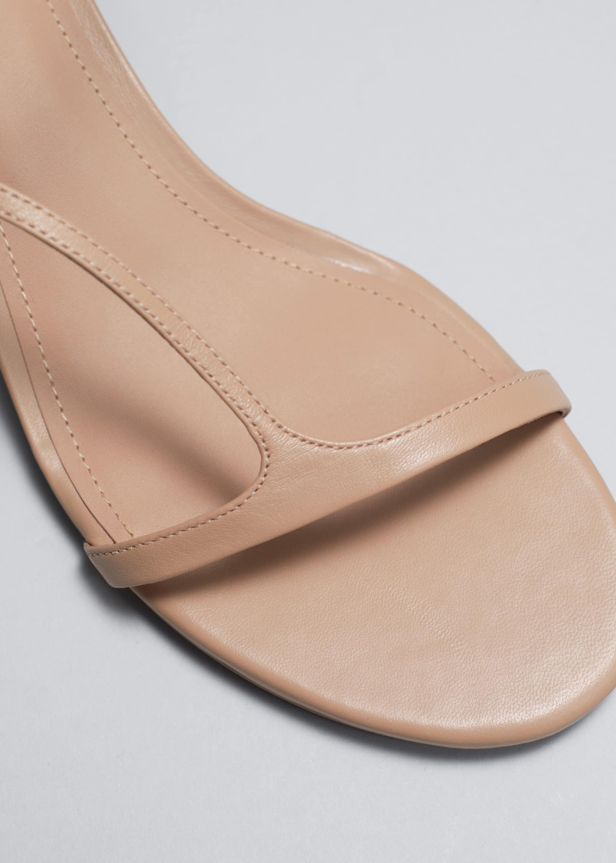 Heeled Leather Sandals - {{variantName}} - Descriptive Detail