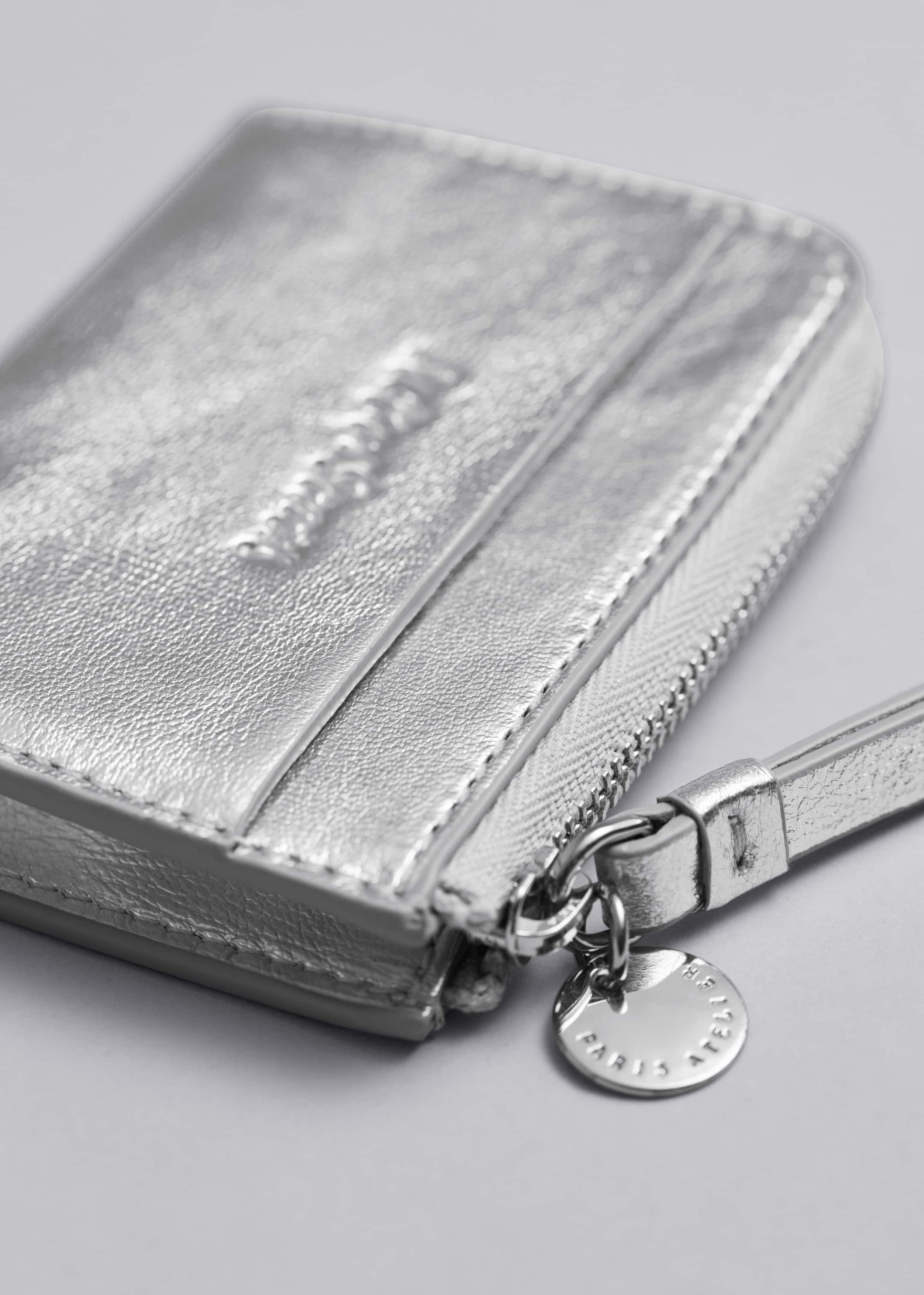 Charm Mini Wallet - {{variantName}} - Descriptive Detail