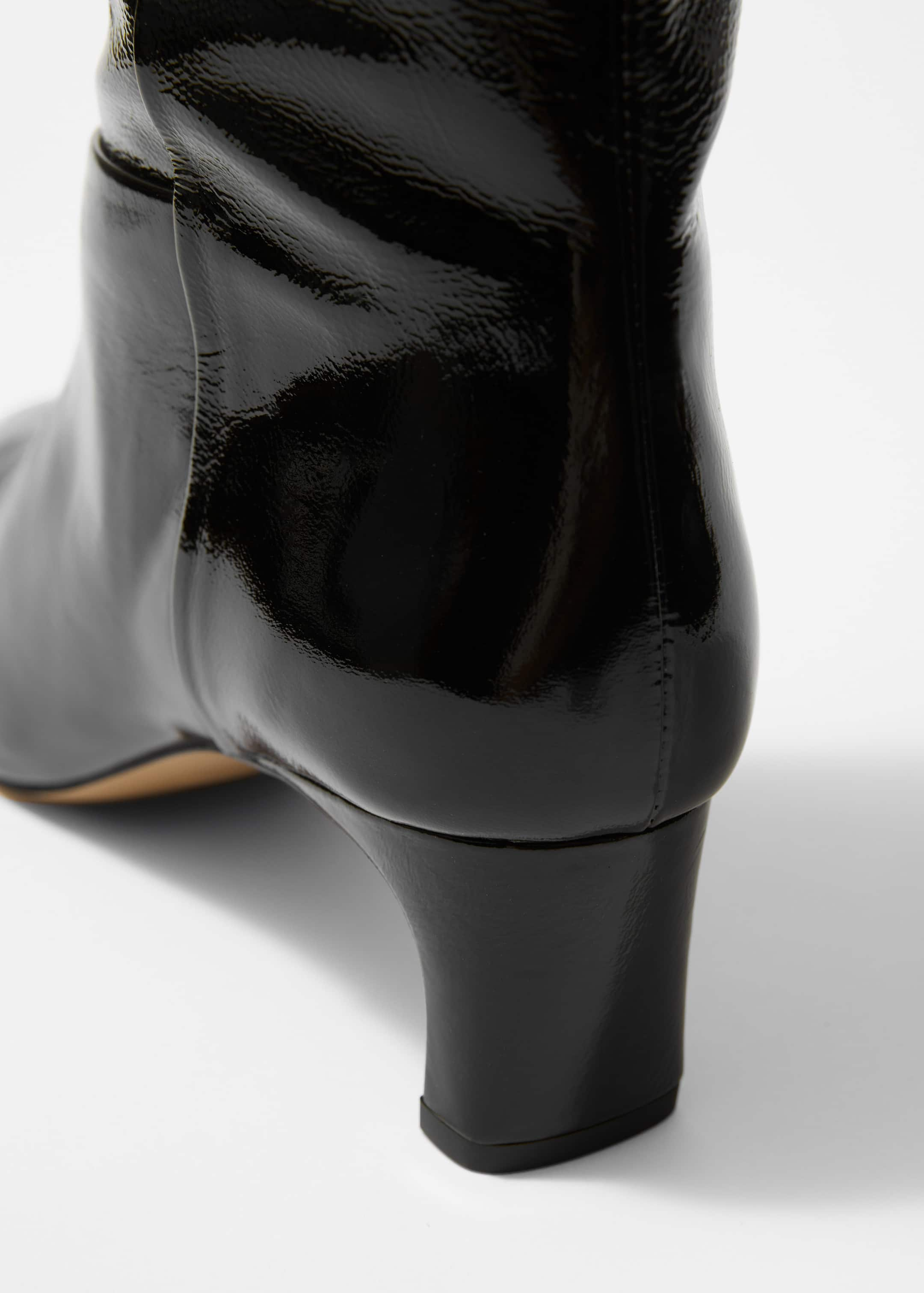 Pointed-Toe Knee-High Boots - {{variantName}} - Descriptive Detail