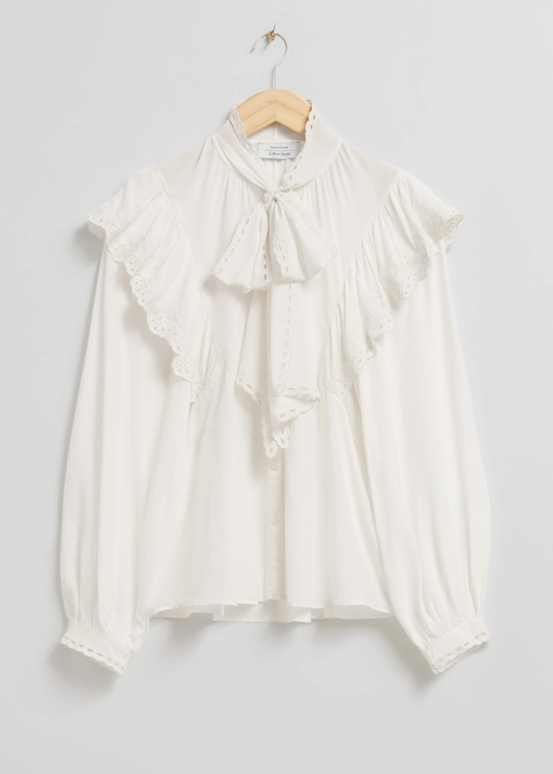 Blouse à volants festonnés