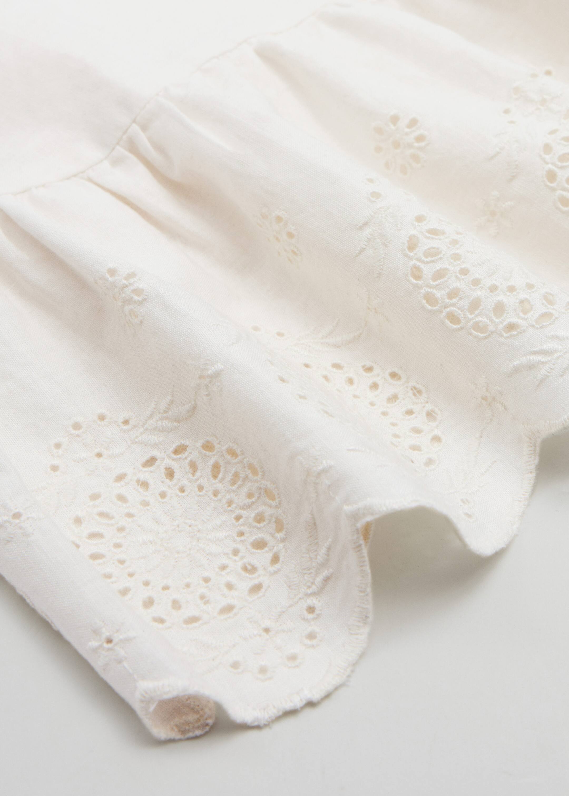 Haut sans manches à broderie anglaise - {{variantName}} - Descriptive Detail