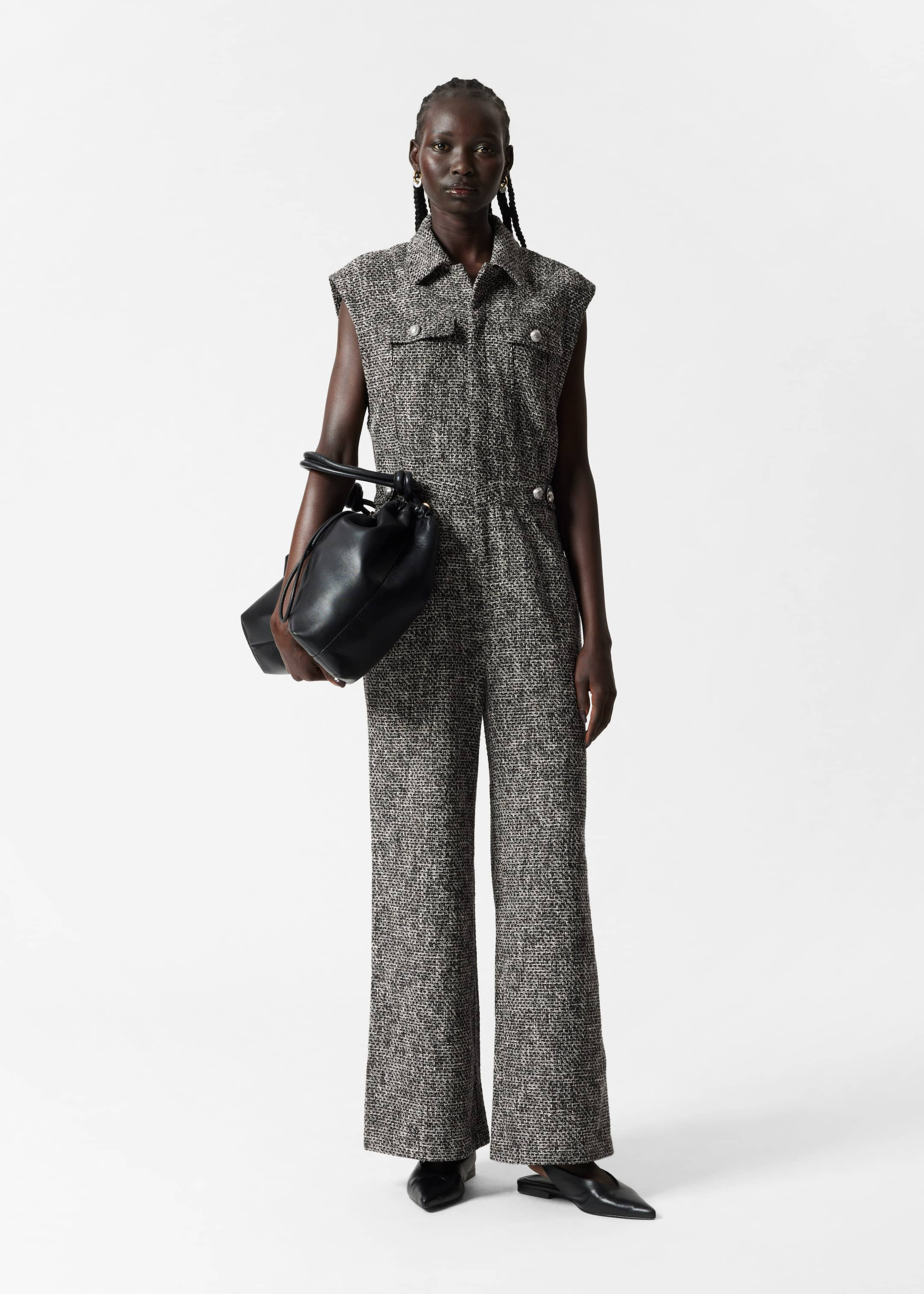 Weiter armelloser Tweed Jumpsuit Schwarzer Tweed Other Stories AT