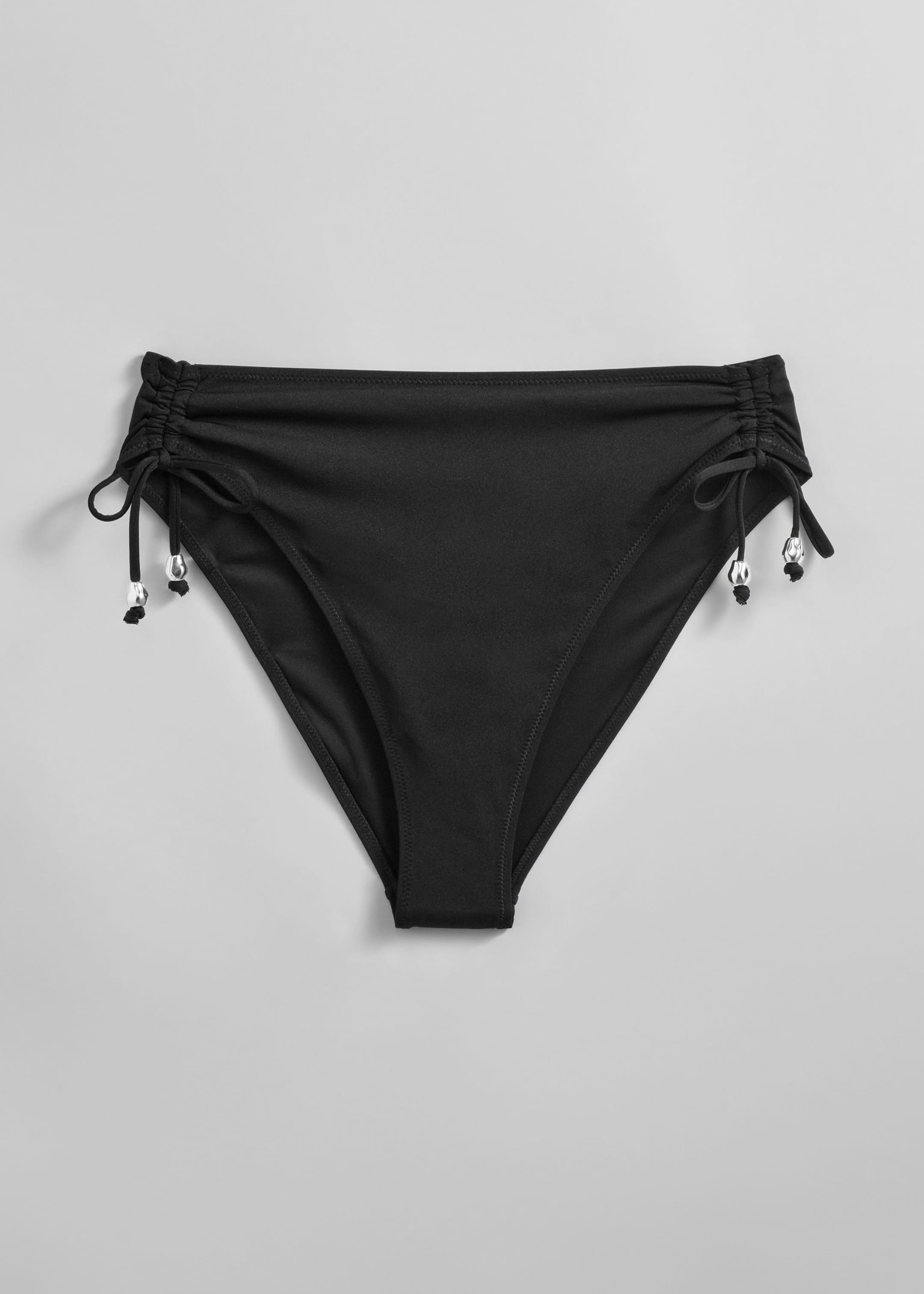 High-Cut Bikini Briefs - Black - Still Life