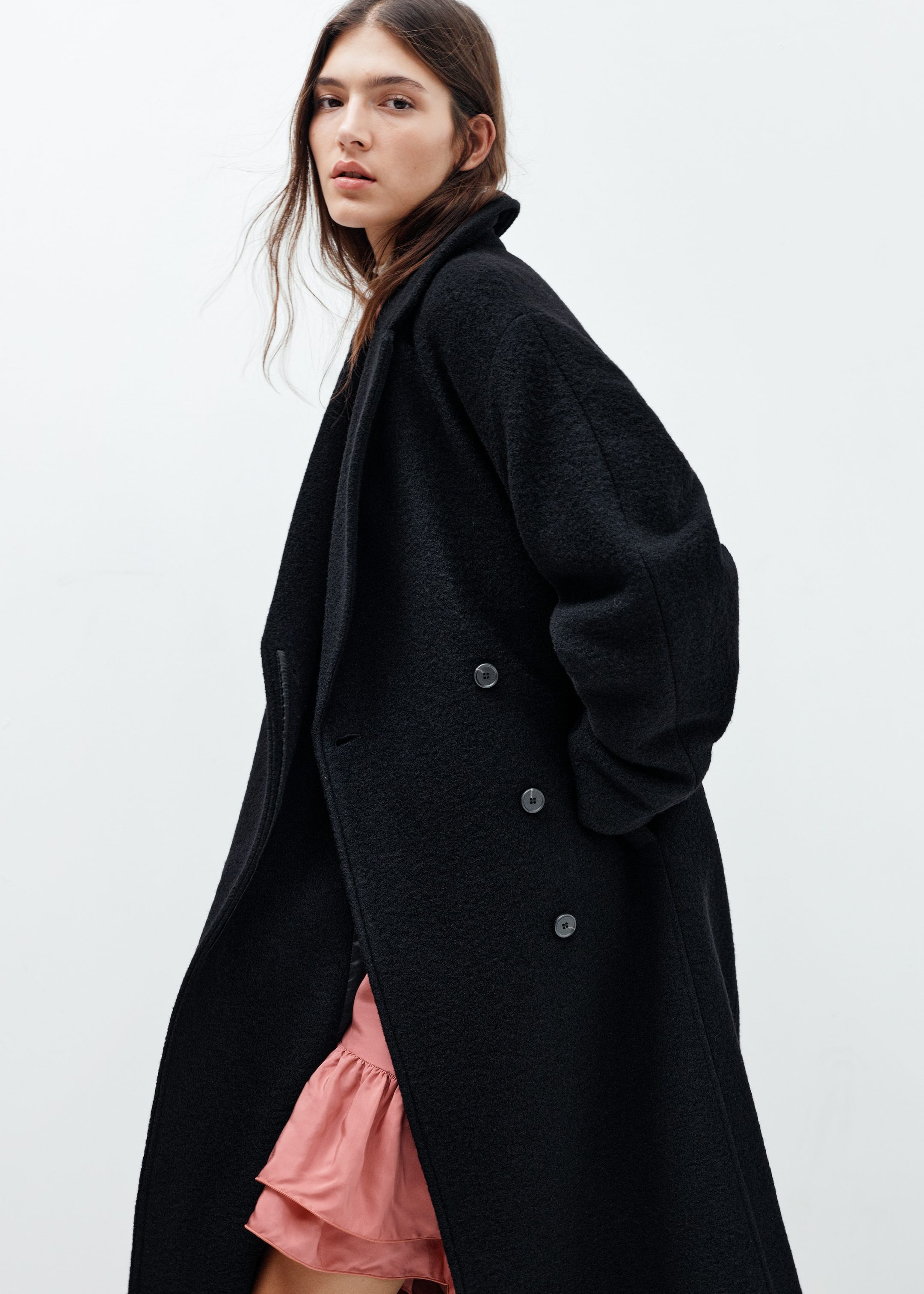 Image of Manteau volumineux en laine avec ceinture