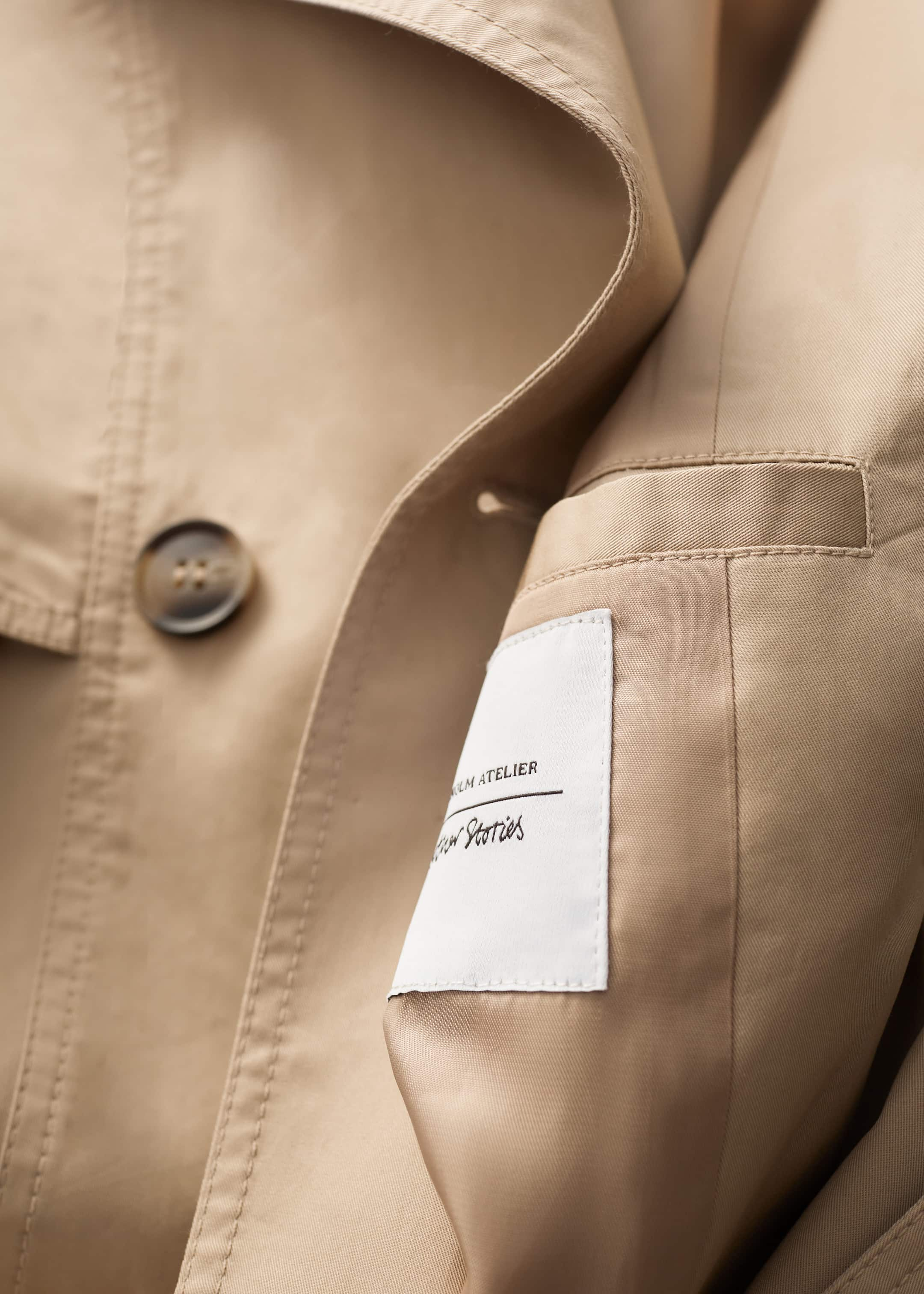 Buckle-Belt Trench Coat - {{variantName}} - Descriptive Detail